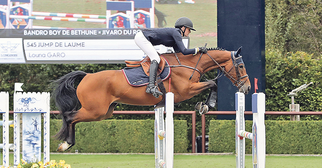 Jump de Laume sous la selle de louna Garo lors du championnat du monde  des stud-Books à Valkenswaart (© ER)